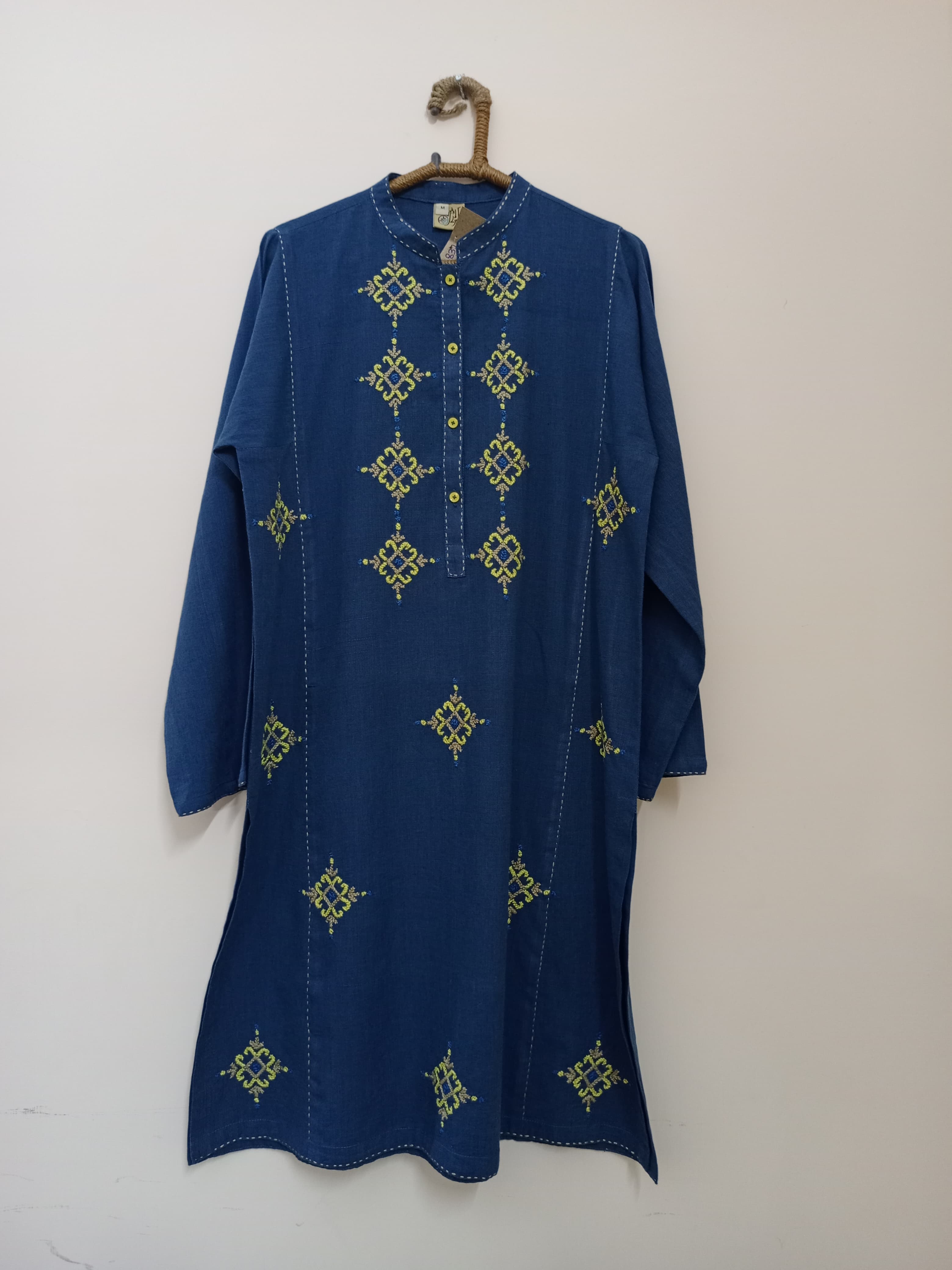 Graceful blue shirt with intricate embroidery, soft breathable fabric, and a classic finish ideal for festive or formal wear.